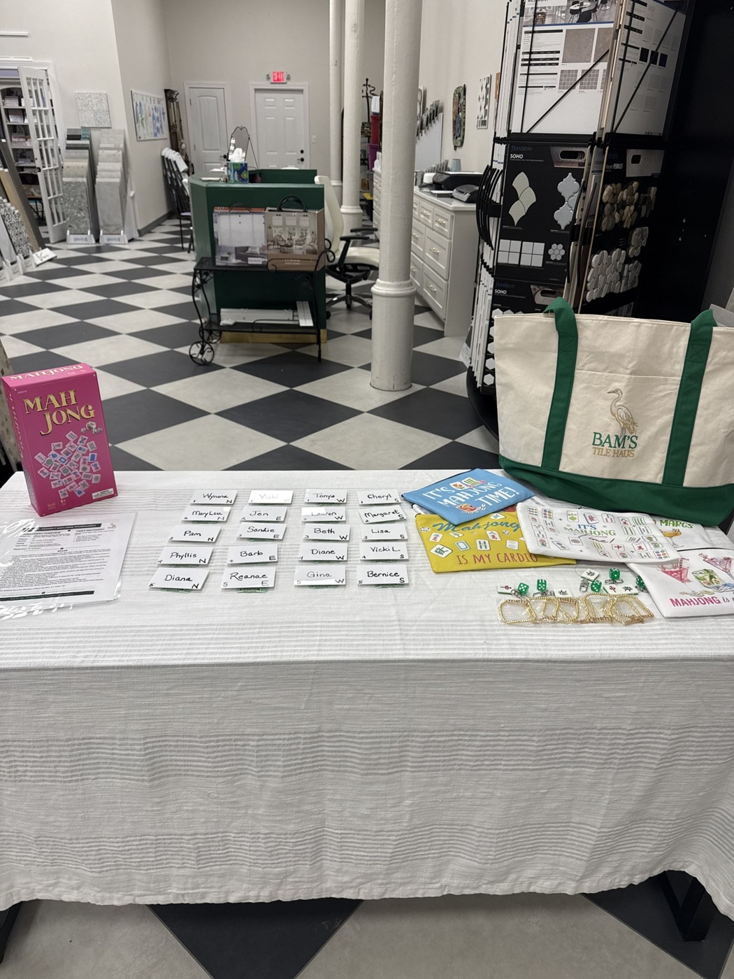 Bam’s Tile Haus tote and mahjong accessories on a welcome table